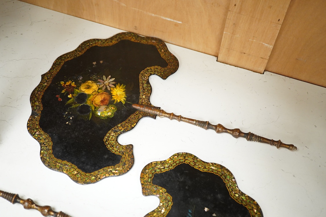 Three early Victorian papier maché hand screens, two with abalone inlay, 39cm in length